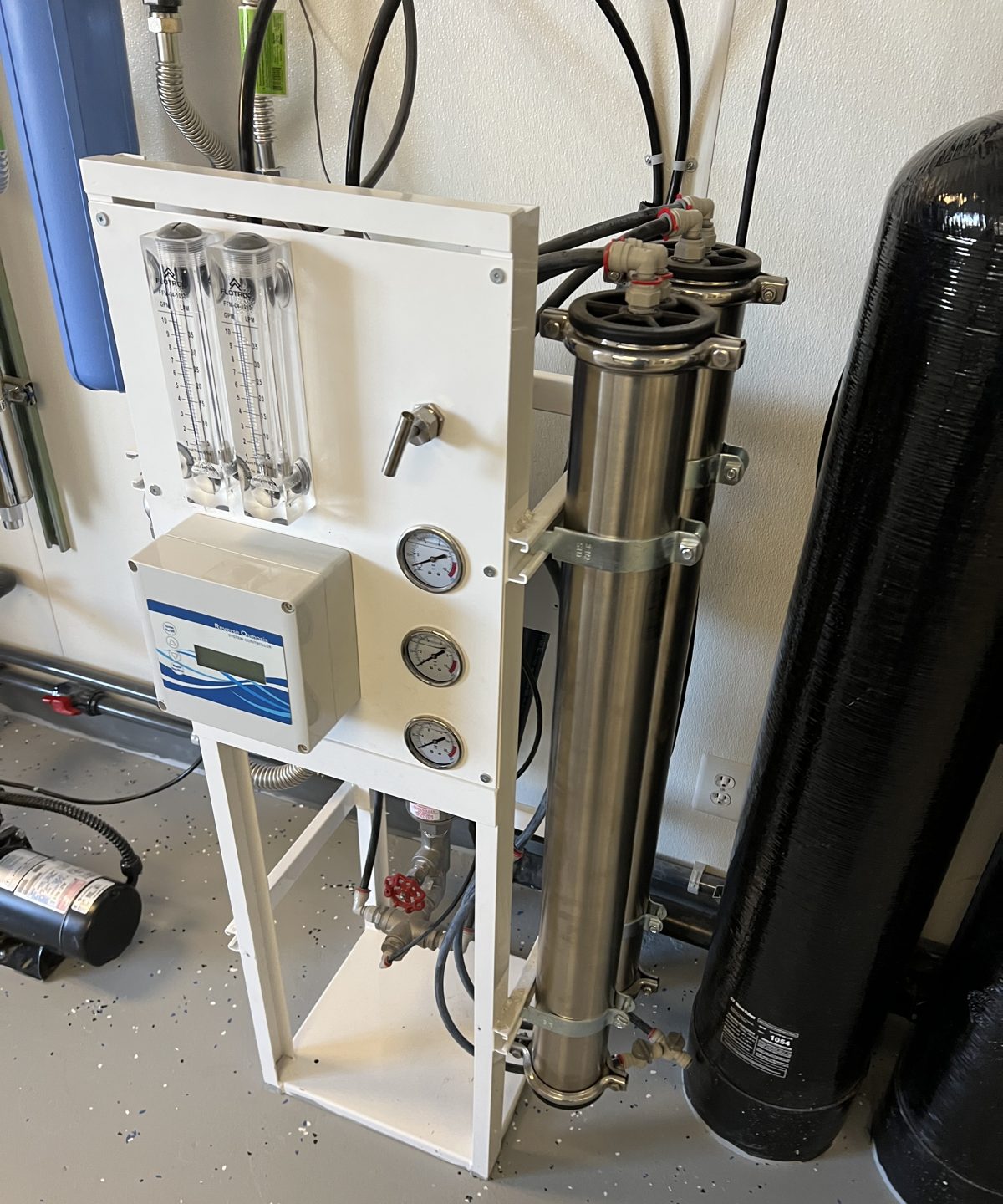 Commercial RO system installed with stainless membranes and mineral tank